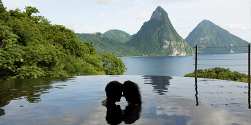 Couple in infinity pool at Jade Mountain
